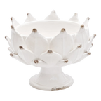 Heirbloom Studio off-white ceramic pedestal bowl with an artichoke petal design and rustic distressed edges.